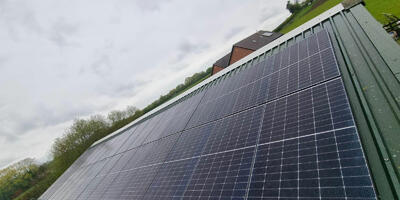 Solar Panel Installation on a Farm's Barn Roof